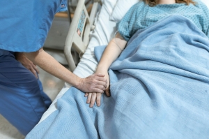 Doctor Holding the Hand of a Patient